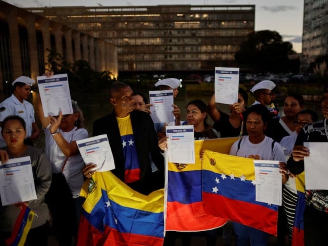 venezuelan citizens take part in a protest against the electoral results that awarded venezuela s president nicolas maduro a third term and to ask the brazilian government to support democracy in front of itamaraty palace in brasilia brazil august 1 2024 photol reuters